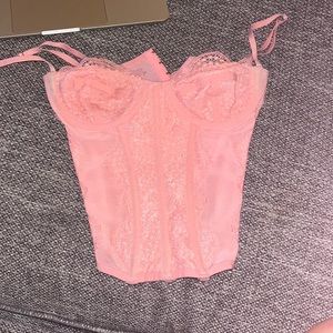 Urban outfitters modern love lace coset in pink. Size small